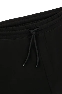 Jogginghose aus Baumwoll-Terry mit blauem Logo-Aufnäher