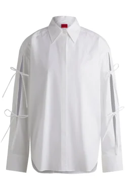 Oversized Bluse aus Baumwolle mit Schleifen am Ärmel