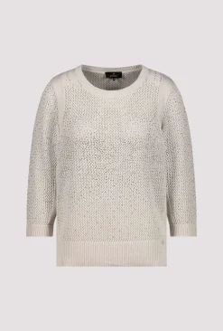 Strickpullover mit Schmuck