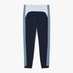 Trainingshose mit zulaufenden Beinen und Colorblock-Design